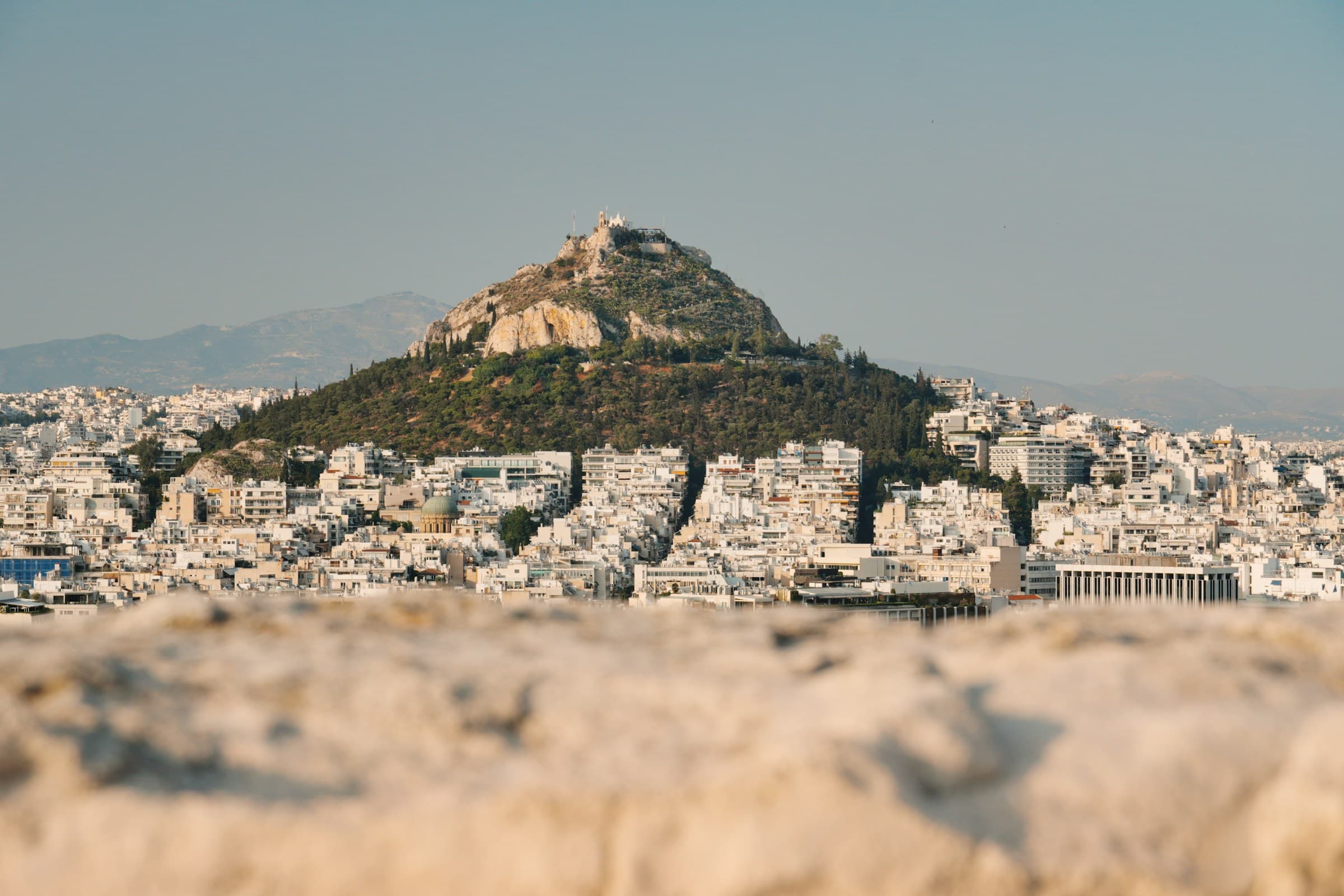 Athens cityscape and Lycabettus Hill in soft daylight